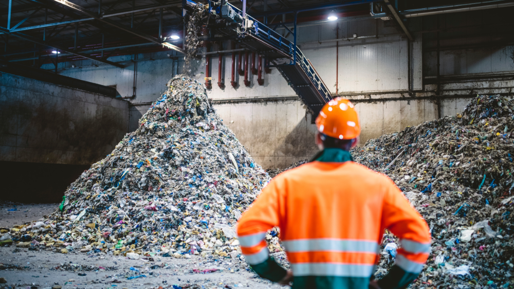 waste-management-worker-in-orange-high-visibility-jacket